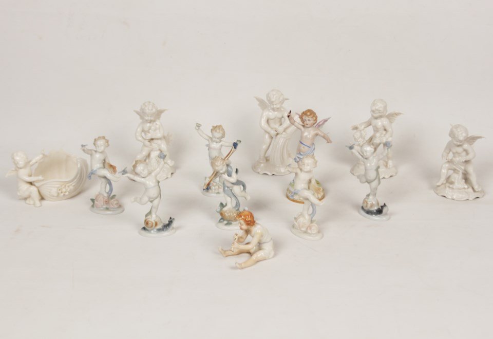 13 PIECE MISCELLANEOUS LOT OF GERMAN PORCELAIN: 13 PIECE MISCELLANEOUS LOT OF GERMAN PORCELAIN FIGURES OF PUTTI AND CUPIDS; CONDITION: ONE WITH WING REPAIRED