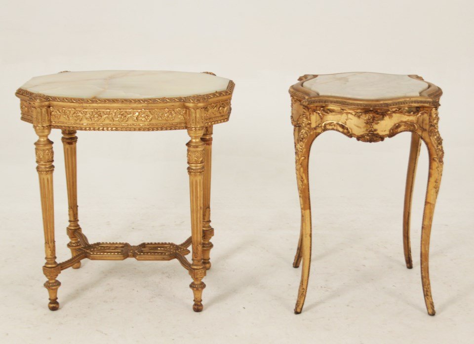 MISCELLANEOUS 2 PIECE LOT OF CARVED GILT WOOD FURNITURE: MISCELLANEOUS 2 PIECE LOT OF CARVED GILT WOOD FURNITURE INCLUDING A SERPENTINE MARBLE TOP LOUIS XV STYLE TABLE, ALONG WITH AN ELONGATED 12 SIDED LOUIS XVI SALON TABLE WITH ONXY TOP; 29.5"H X 28"W X 20