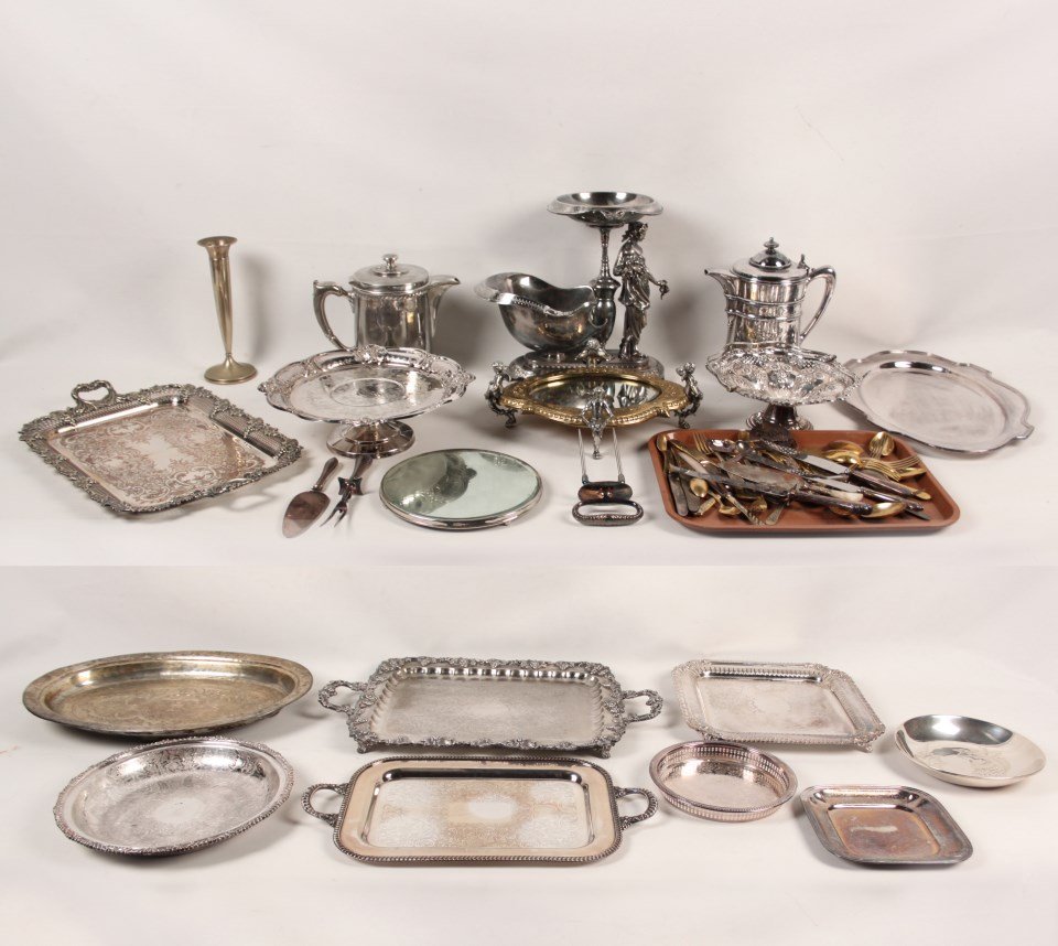 2 MISCELLANEOUS BOX LOTS OF SILVER PLATE: 2 MISCELLANEOUS BOX LOTS OF SILVER PLATE CONSISTING OF A MIRROR PLATEAU WITH CUPID SURMOUNTS, 8 TRAYS, BASKET, FOOTED COMPOTE, 2 PITCHERS, FIGURAL CENTERPIECE, 2 SHALLOW BOWLS, TRUMPET VASE