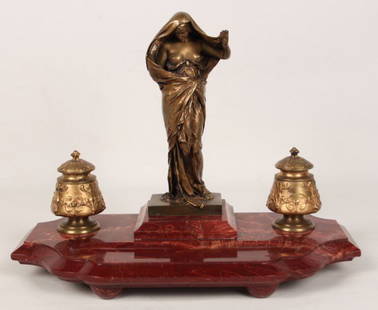 FRENCH BRONZE AND ROUGE MARBLE INKWELL: FRENCH BRONZE AND ROUGE MARBLE INKWELL WITH PARTIALLY NUDE FIGURE, "NATURE REVEALING HERSELF", SIGNED E. BARRIAS, WITH FOUNDRY MARK "SUSSE FRERES EQITEURS PARIS"; 12"H X 16"W X 8"D; CONDITION: 1 GLASS