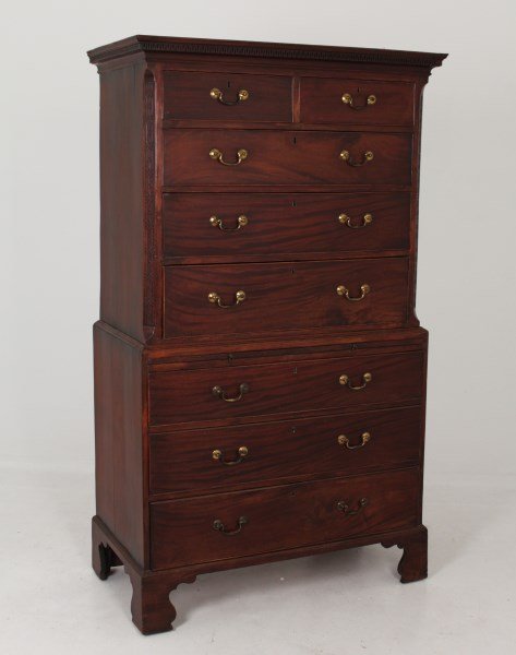 FINE GEORGE III MAHOGANY CHEST ON CHEST: FINE GEORGE III MAHOGANY CHEST ON CHEST HAVING GREEK KEY CARVED CORNICE AND FRETWORK CARVED CHAMFERED CORNERS WITH BRUSHING SLIDE ON BRACKET FEET, ATTAINING ORIGINAL HARDWARE; 74"H X 42"W X 22"D