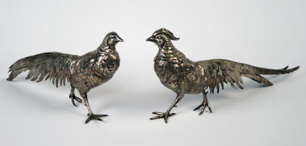 PAIR OF CONTINENTAL SILVER PHEASANT FORMED TABLE: PAIR OF CONTINENTAL SILVER PHEASANT FORMED TABLE ORNAMENTS HAVING REMOVABLE HEADS, TESTED AT LEAST .800 PURE; 6"H X 12"L, 20.96 TROY OZS. WEIGHABLE