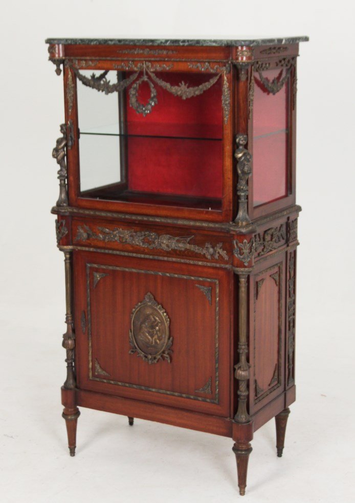 LOUIS XVI STYLE MAHOGANY VITRINE CABINET: LOUIS XVI STYLE BRONZE MOUNTED MAHOGANY MARBLE TOP VITRINE CABINET HAVING PUTTI SURMOUNTS; 56.6"H X 29.5"W X 17.5"D