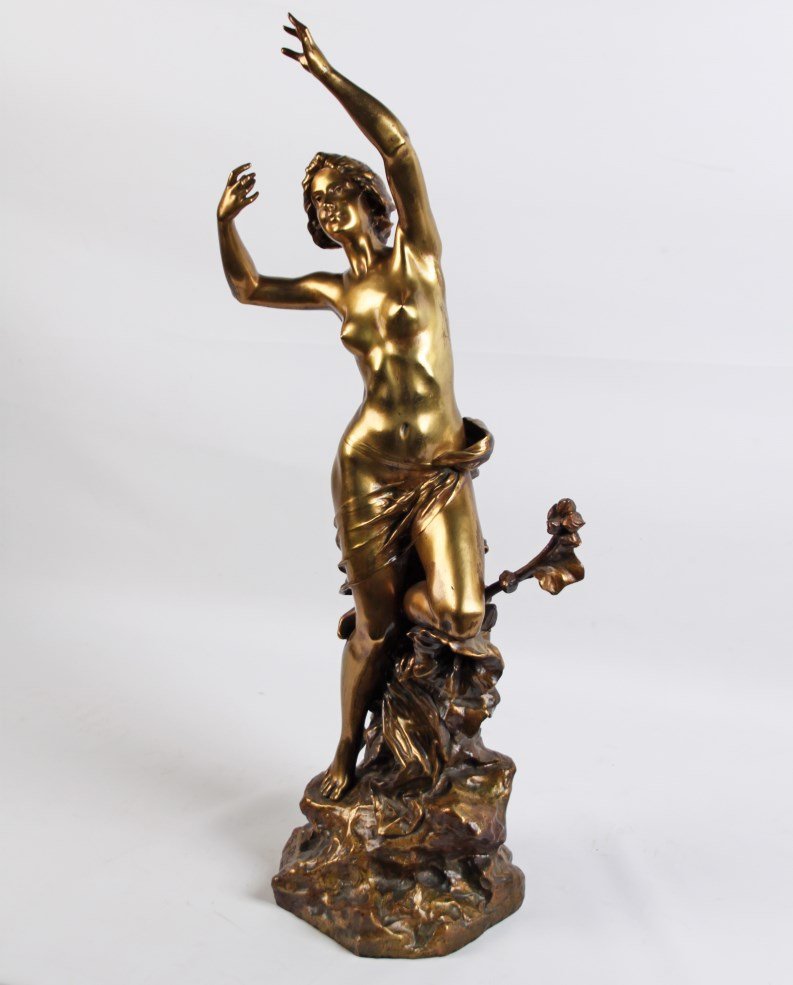 G. OBIOLS, ART NOVEAU GILT BRONZE NUDE: ART NOVEAU GILT BRONZE NUDE ON A STYLIZED ROCK AND FLORAL STAND INSCRIBED ON ROCKS "G. OBIOLS"; 30"H X CONDITION: DRILLED