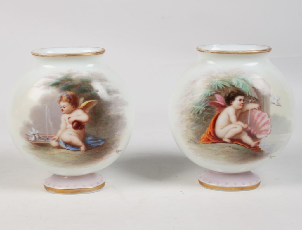 PAIR OF SIGNED OVOID SHAPED BRISTOL GLASS TYPE VASES: PAIR OF OVOID SHAPED BRISTOL TYPE GLASS VASES WITH WINGED CUPID DECORATION SIGNED AHNE; 9"H X 8"W X 5"D