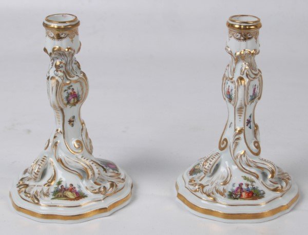 PAIR OF 7" GERMAN MEISSEN PORCELAIN CANDLESTICKS: PAIR OF 7" GERMAN MEISSEN PORCELAIN ROCAILLE FORMED GOLD GILT CANDLESTICKS HAVING FIGURAL COURTSCENE VIGNETTES AND INSECTS PAINTED IN FREE FORM WITH BLUE CROSS SWORDS UNDERGLAZE ON THE REVERSE; 7"H
