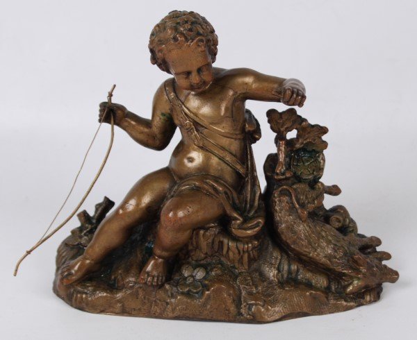 BRONZE SCULPTURE OF YOUNG BOY HOLDING BOW WITH GAME: BRONZE SCULPTURE OF YOUNG BOY HOLDING BOW WITH GAME; 9"H X 10"W