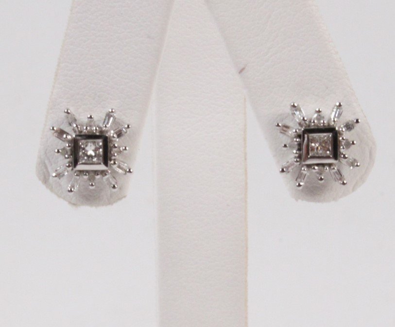 PAIR OF 14K DIAMOND STARBURST SHAPED STUD EARRINGS: PAIR OF 14K WHITE GOLD DIAMOND STARBURST SHAPED STUD EARRINGS HAVING 0.50 CTW DIAMONDS