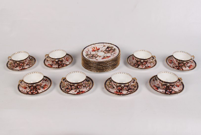 26 PIECES OF ROYAL CROWN DERBY: 26 PIECES OF ROYAL CROWN DERBY CONSISTING OF 8 CUPS AND SAUCERS AND 10 BREAD PLATES WITH IRON RED MARK ON THE REVERSE; 7"DIA. BREAD PLATES, 2"H CUPS, 5.75"DIA. SAUCERS