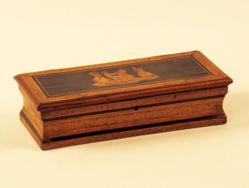 FINE PENWORK INLAID CIGAR BOX: FINE PENWORK INLAID CIGAR BOX HAVING CENTRAL RESERVE OF DANCING FIGURES AND INLAY IN EBONY ON THE REVERSE READING "SORRENTO"; 2.75"H X 10.5"W X 4.5"D