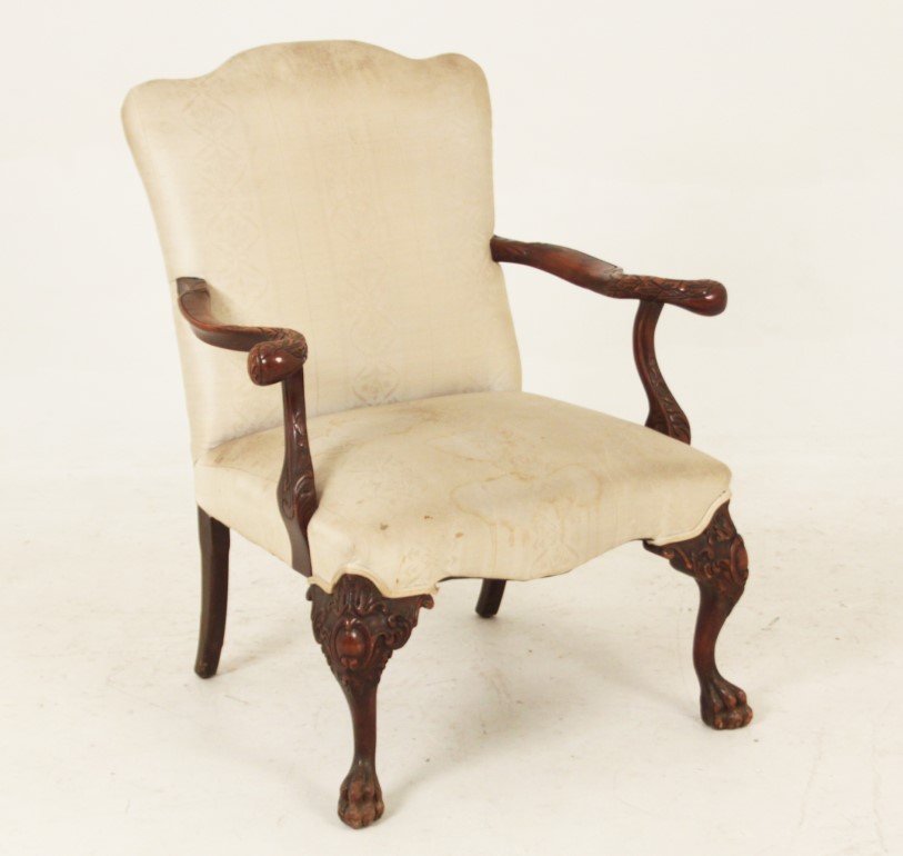 IRISH CHIPPENDALE GAINSBORO STYLE ARM CHAIR: IRISH CHIPPENDALE GAINSBORO STYLE CARVED MAHOGANY ARM CHAIR; 38"H X 25"W X 23"D; FABRIC STAINED, STRUCTURALLY SOUND