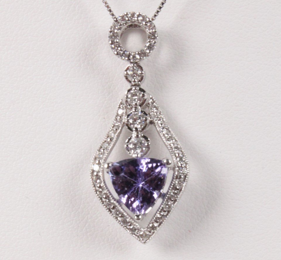 14K DIAMOND AND TANZANITE PENDANT NECKLACE: 14K WHITE GOLD DIAMOND AND TANZANITE PENDANT WITH CHAIN HAVING 2.10 CT TANZANITE AND 0.63 CTW DIAMONDS