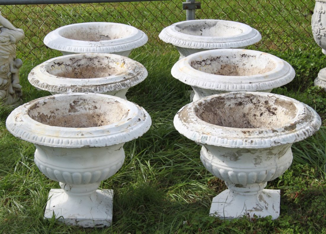 GROUP OF 6 CAST STONE URNS: GROUP OF 6 CAST STONE URNS