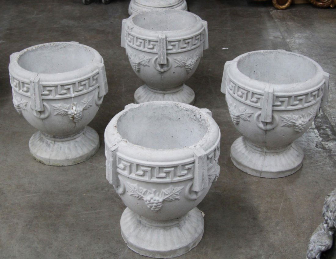 GROUP OF 4 CAST STONE URNS (1 of 1)