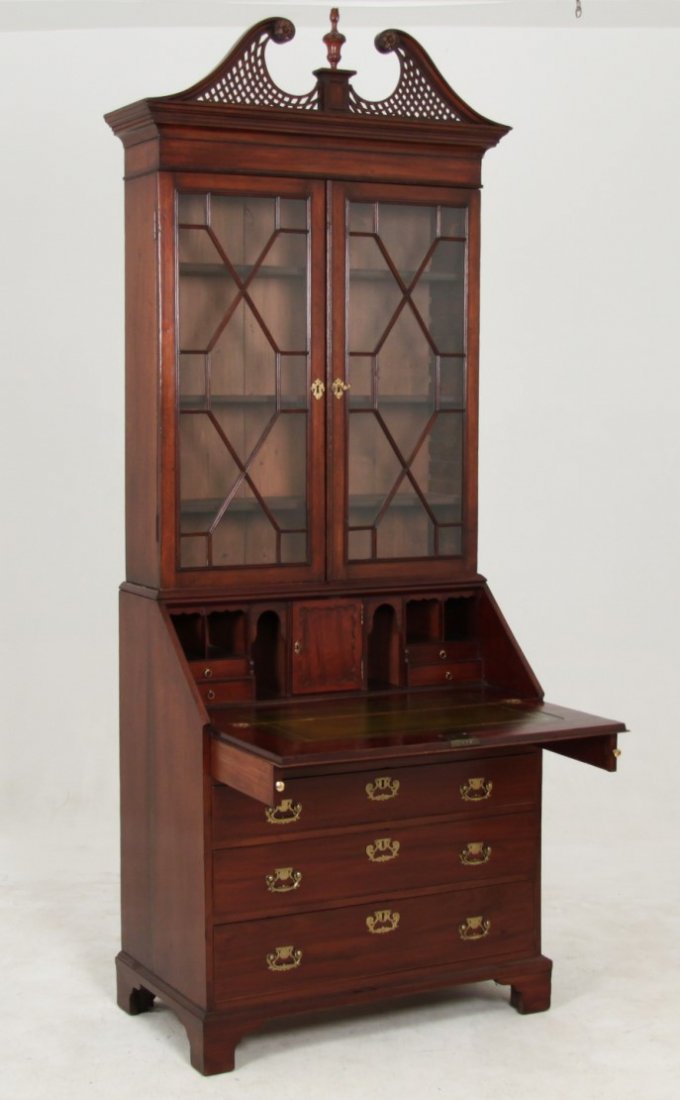 PETITE GEORGE III MAHOGANY BUREAU: FINE PETITE GEORGE III MAHOGANY BUREAU HAVING OPEN WORK ROSSET CARVED SWAN NECK PEDIMENT WITH LEATHER WRITING SURFACE ON BRACKET FEET, ATTAINING ORIGINAL HARDWARE; 95"H X 36"W X 22"D