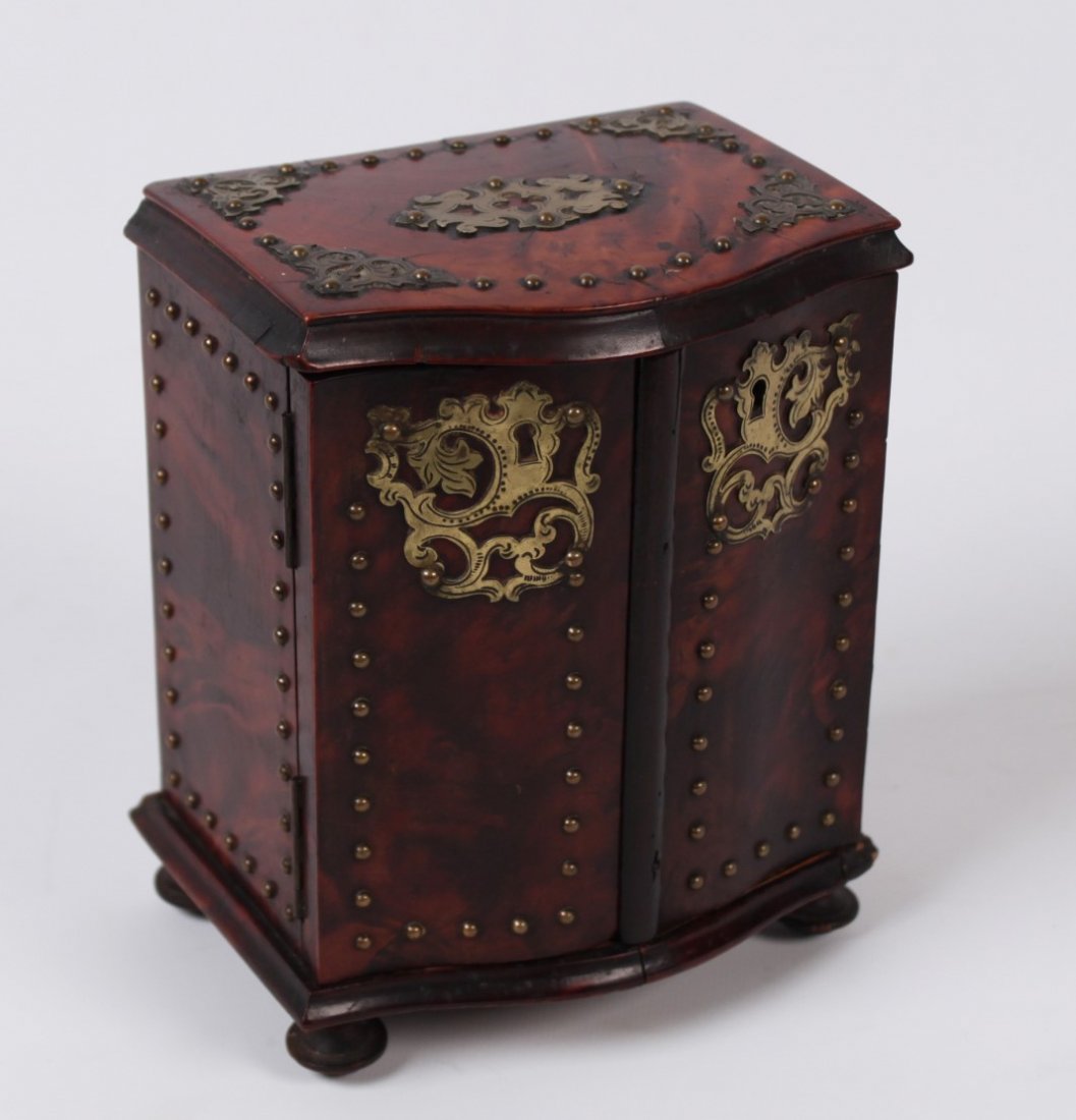 BRASS INLAID BURL WALNUT SERPENTINE FITTED BOX: BRASS INLAID BURL WALNUT SERPENTINE FITTED BOX; 7"H X 5.5"W X 3.5"D