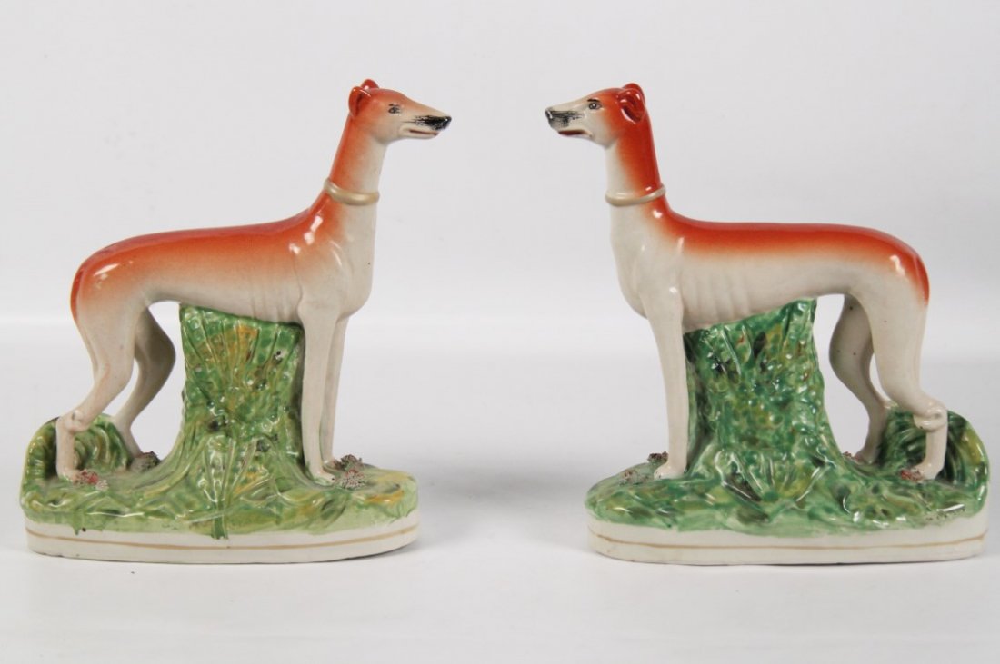 PAIR OF STAFFORDSHIRE PORCELAIN WHIPPETS: PAIR OF STANDING STAFFORDSHIRE PORCELAIN WHIPPETS; 11"H X 9"W X 3.5"D