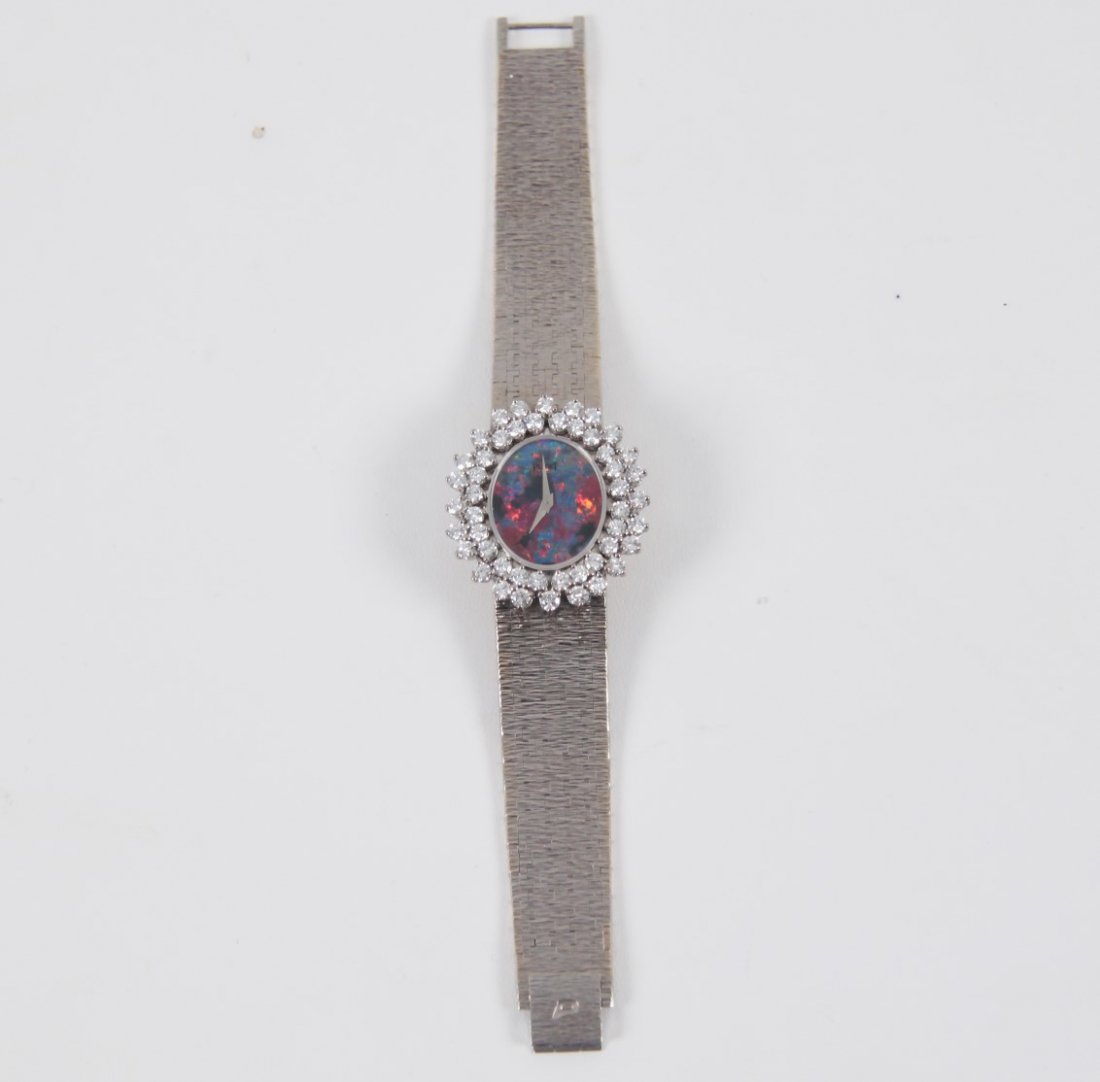 18K LADY'S DIAMOND WATCH BY PIAGET (1 of 2)