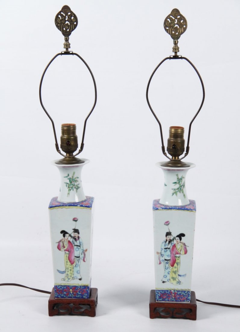 PAIR OF CHINESE FAMILLE PORCELAIN VASES: PAIR OF CHINESE FAMILLE PORCELAIN QUADRAFOIL TAPERD SHAPED VASES WITH FIGURAL VIGNETTES; 26"H OVERALL; CONDITION: DRILLED NOW, WIRED FOR LAMPS