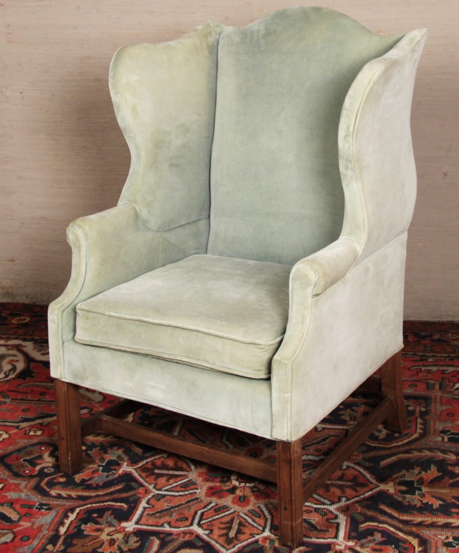 GEORGIAN DESIGNED MAHOGANY WING CHAIR: GEORGIAN DESIGNED MAHOGANY WING CHAIR WITH PEGGED STRETCHER; 46"H X 30"W X 22"D
