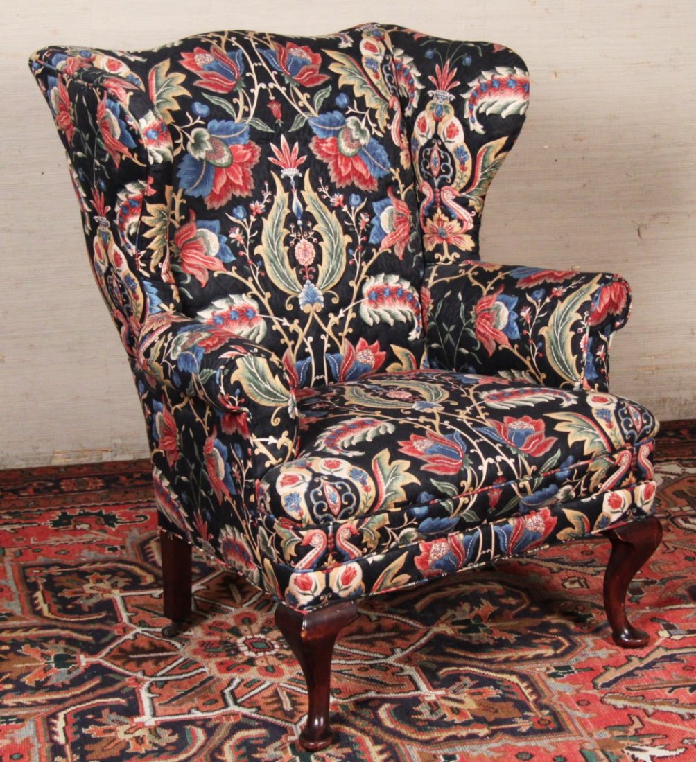 ENGLISH QUEEN ANNE STYLE MAHOGANY WING CHAIR: ENGLISH QUEEN ANNE STYLE MAHOGANY WING BACK ARM CHAIR ON CABRIOLE LEGS AND PAD FEET, LATE 19TH/20TH C.; 45"H X 38"W X 36"D; CONDITION: STRUCTURALLY SOUND AND FABRIC IN DECENT CONDITION