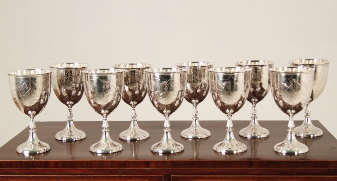 SET OF 10 IMPRESSIVE HAND ENGRAVED SIILVER CHALICES: SET OF 10 IMPRESSIVE FLORAL DESIGNED HAND ENGRAVED SILVER CHALICES WITH ROLLED EDGE LIP; 10"H X 5.5"DIA.