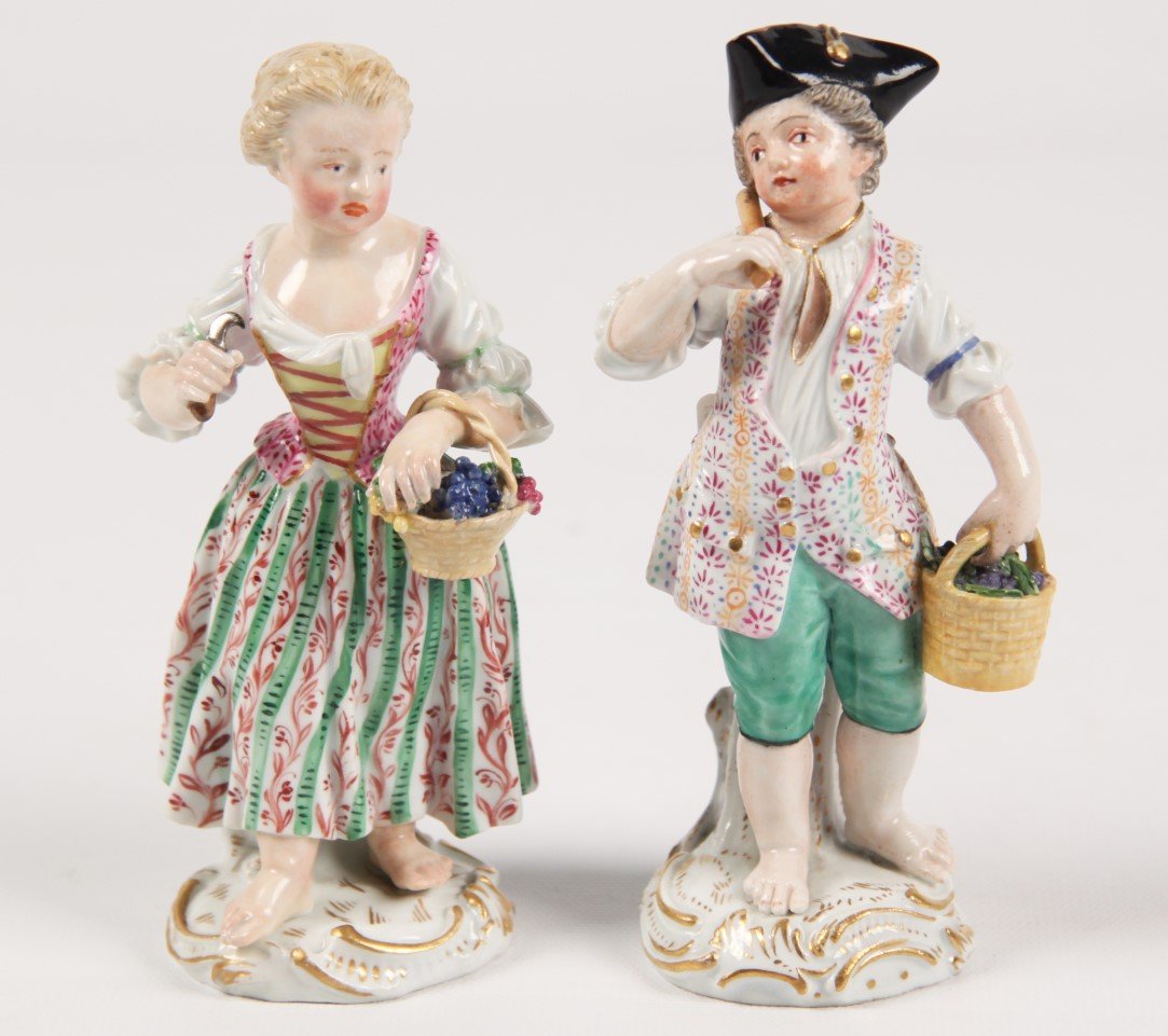 PAIR OF GERMAN MEISSEN FIGURINES: PAIR OF GERMAN MEISSEN CABINET FIGURINES OF WELL COSTUMED FRENCH FIGURES GATHERING GRAPES RESTING ON ROCAILLE GOLD EMBELLISHED BASES; 5.5"H