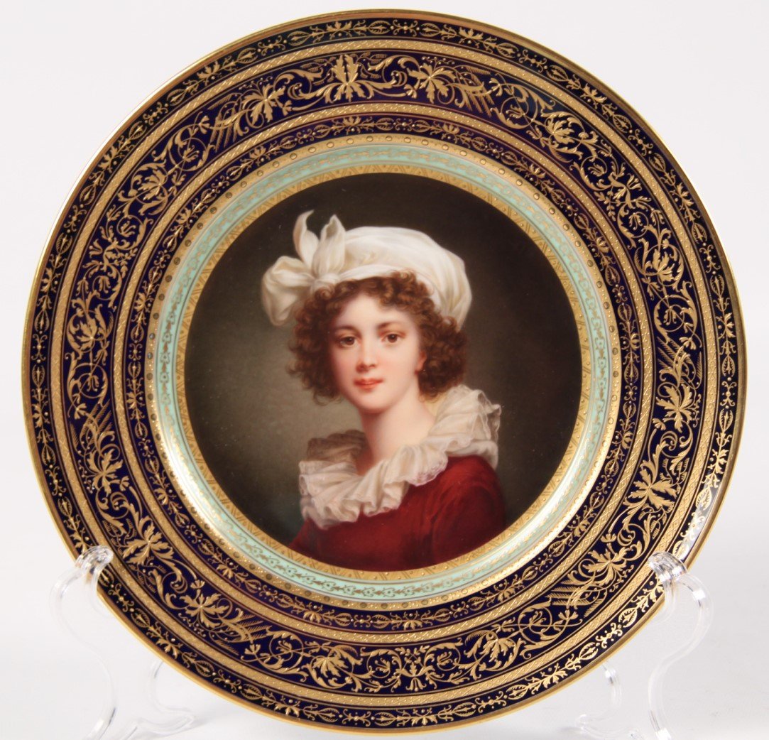 VIENNA PORTRAIT CABINET PLATE: VIENNA PORTRAIT CABINET PLATE HAVING MULTI-RAISED GOLD AND COBALT BORDERS WITH TEAL CONCAVE TRANSITION RING AND FINALLY PYRAMID DESIGN GOLD INTER RING MARKED ON REVERSE IN BLACK UNDERGLAZE "LOUISE LEB
