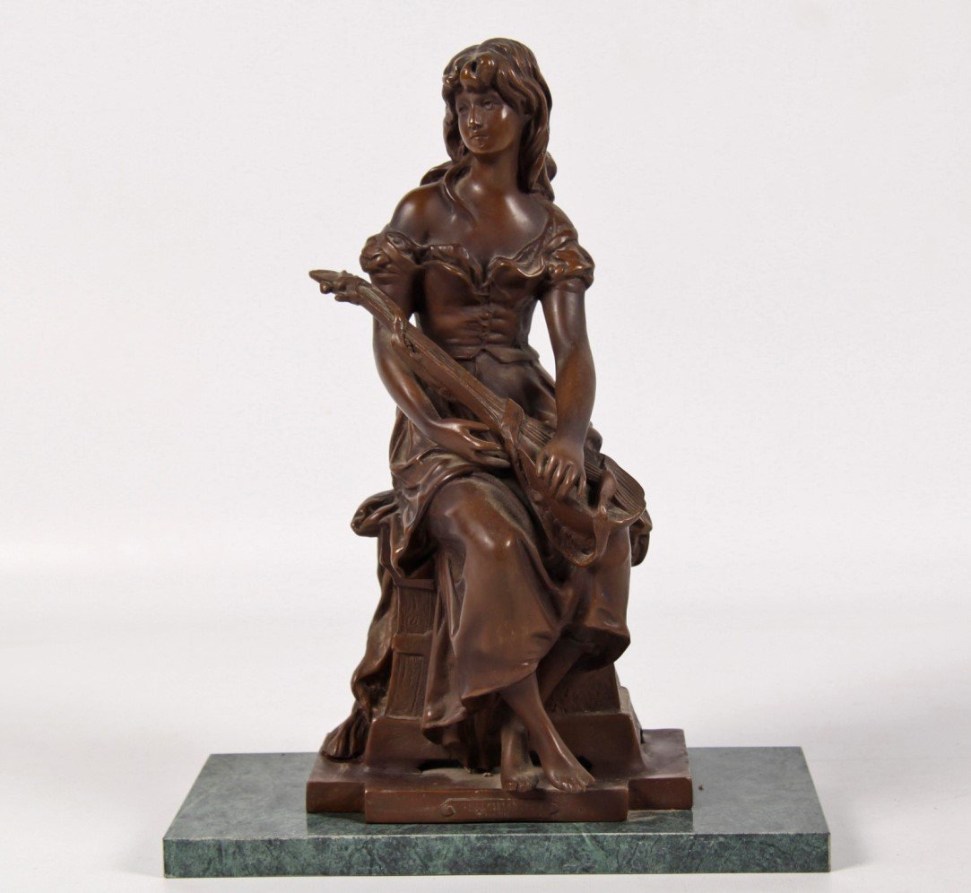FRENCH BRONZE FIGURE OF SEATED GIRL HOLDING LUTE: FRENCH BRONZE FIGURE OF SEATED GIRL HOLDING LUTE WITH PLAQUE ON BASE READING "MIGNON" RESTING ON A VERDE MARBLE RECTANGULAR STAND; 13"H X 10.25"W X 4.75"D
