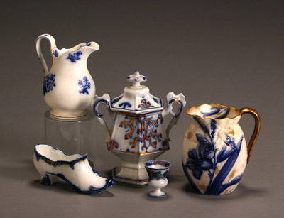 Group of Five Copper Lustre and Gilt Decorated Table: Group of Five Copper Lustre and Gilt Decorated Table Articles Consisting of two cream pitchers, a covered sugar bowl, a toothpick holder and a shoe. Cracks to body of one cream pitcher; repair to