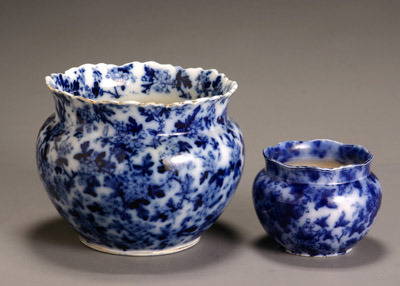 Two Flow Blue Jardinières: Two Flow Blue Jardinières One in the 'Astoria' pattern. Hairline crack to bottom of larger jardinière. Height of larger: 8-3/8 in