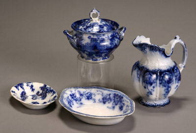 Wood & Son Flow Blue 'Marlborough' Pitcher, a Merce: Wood & Son Flow Blue 'Marlborough' Pitcher, a Mercer 'Paisley' Dish, a Johnson Bros. 'Richmond' Open Vegetable Dish and a Covered Sugar Bowl Sugar bowl with chip to base and small chip to rim; chips