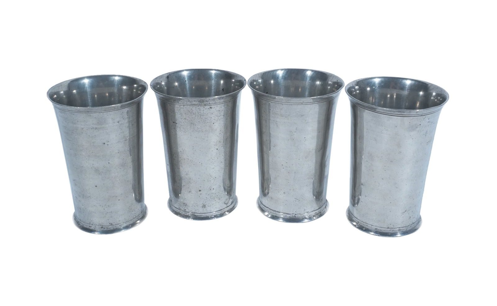 Set of Four American Pewter Flared Lip Beakers, Samuel Danforth (1774-1816), Hartford, Circa 1805: Set of Four American Pewter Flared Lip BeakersSamuel Danforth (1774-1816), Hartford, Circa 1805Undersides stamped, including maker's mark.Property from the Helen M. Huling TrustHeight of each: 5-1/8 i