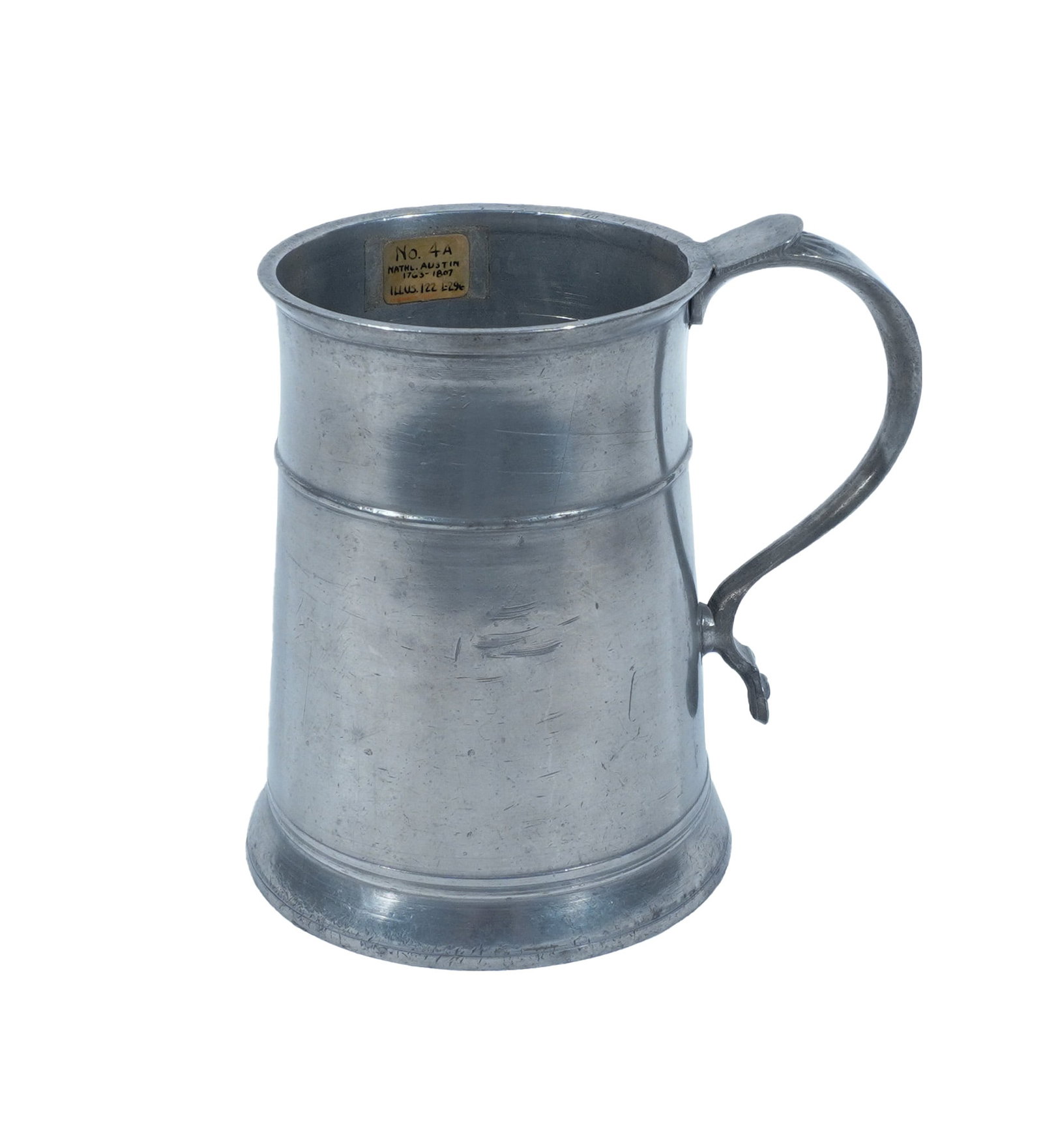 Massachusetts Pewter Kettledrum Mug, Nathaniel Austin (Active 1763-1807), Charlestown, Circa 1800: Massachusetts Pewter Kettledrum Mug Nathaniel Austin (Active 1763-1807), Charlestown, Circa 1800 Stamped maker's mark to pendant of handle. Property from the Helen M. Huling Trust Height: 6 in (15.2 c