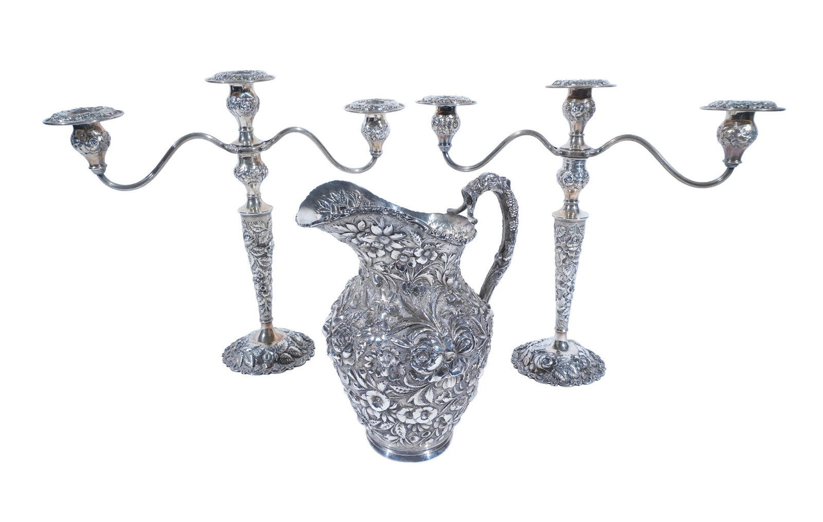 Stieff Sterling Silver Water Pitcher and a Pair of Stieff Weighted Candelabra, Baltimore, Rose: Stieff Sterling Silver Water Pitcher and a Pair of Stieff Weighted Sterling Silver Candelabra Baltimore, Rose Pattern, Introduced 1892, First Quarter 20th Century and Earlier The vestigially gilt cand