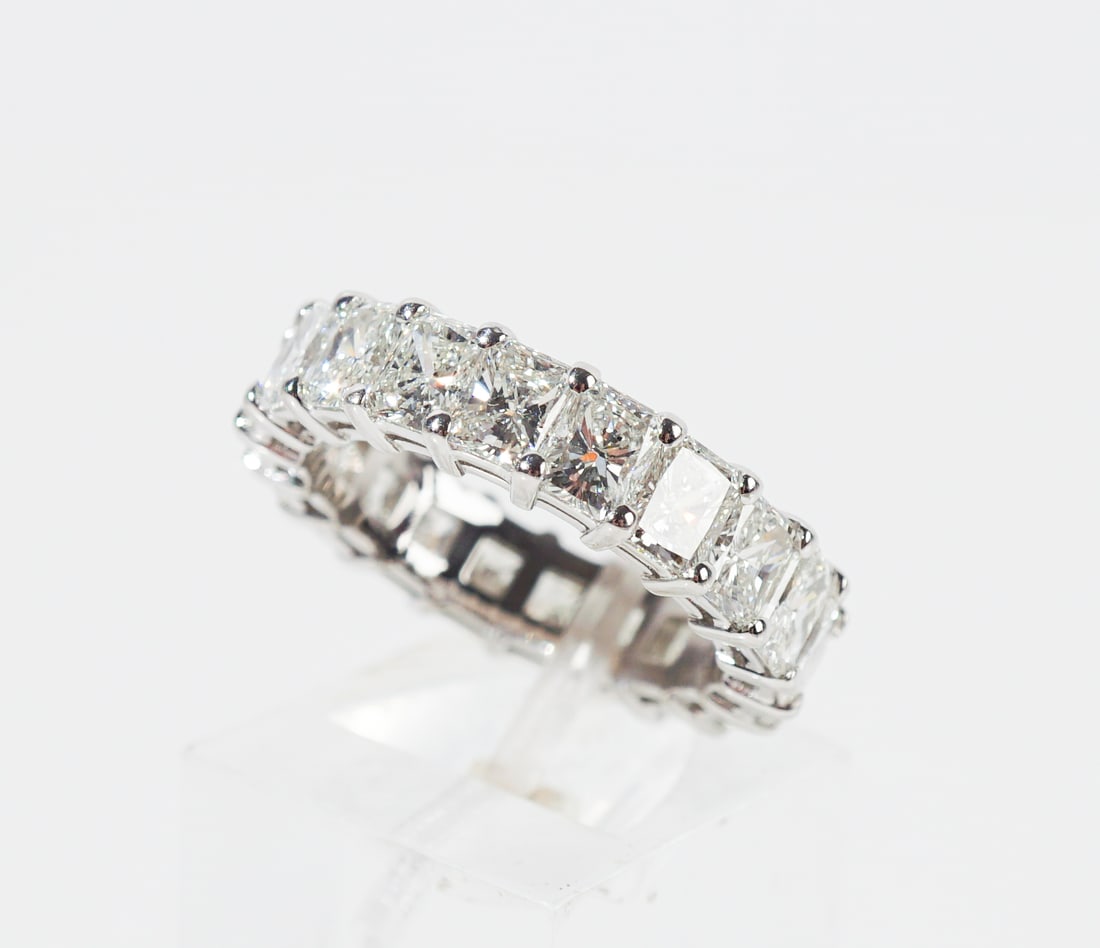 Platinum and Diamond Eternity Ring, Gross weight: 4.7 dwt., Shank size: 6-1/4: Platinum and Diamond Eternity Ring Set with twenty radiant-cut diamonds weighing approximately 6.10 carats. Gross weight: 4.7 dwt. Shank size: 6-1/4