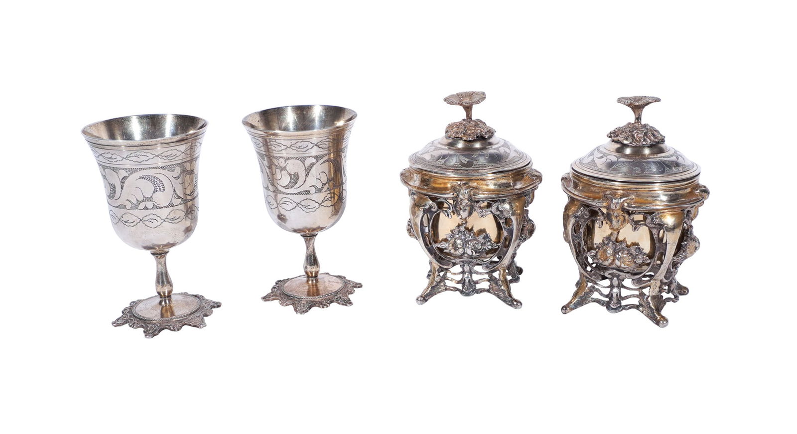 Pair of Ottoman Empire Partial Gilt Chased Silver Covered Condiment Bowls on Cast Rocaille Stands: Pair of Ottoman Empire Partial Gilt Chased Silver Covered Condiment Bowls on Cast Rocaille Stands and a Pair of Chased Silver Stem GobletsTurkish, Late 19th-Early 20th CenturyEach piece stamped with A