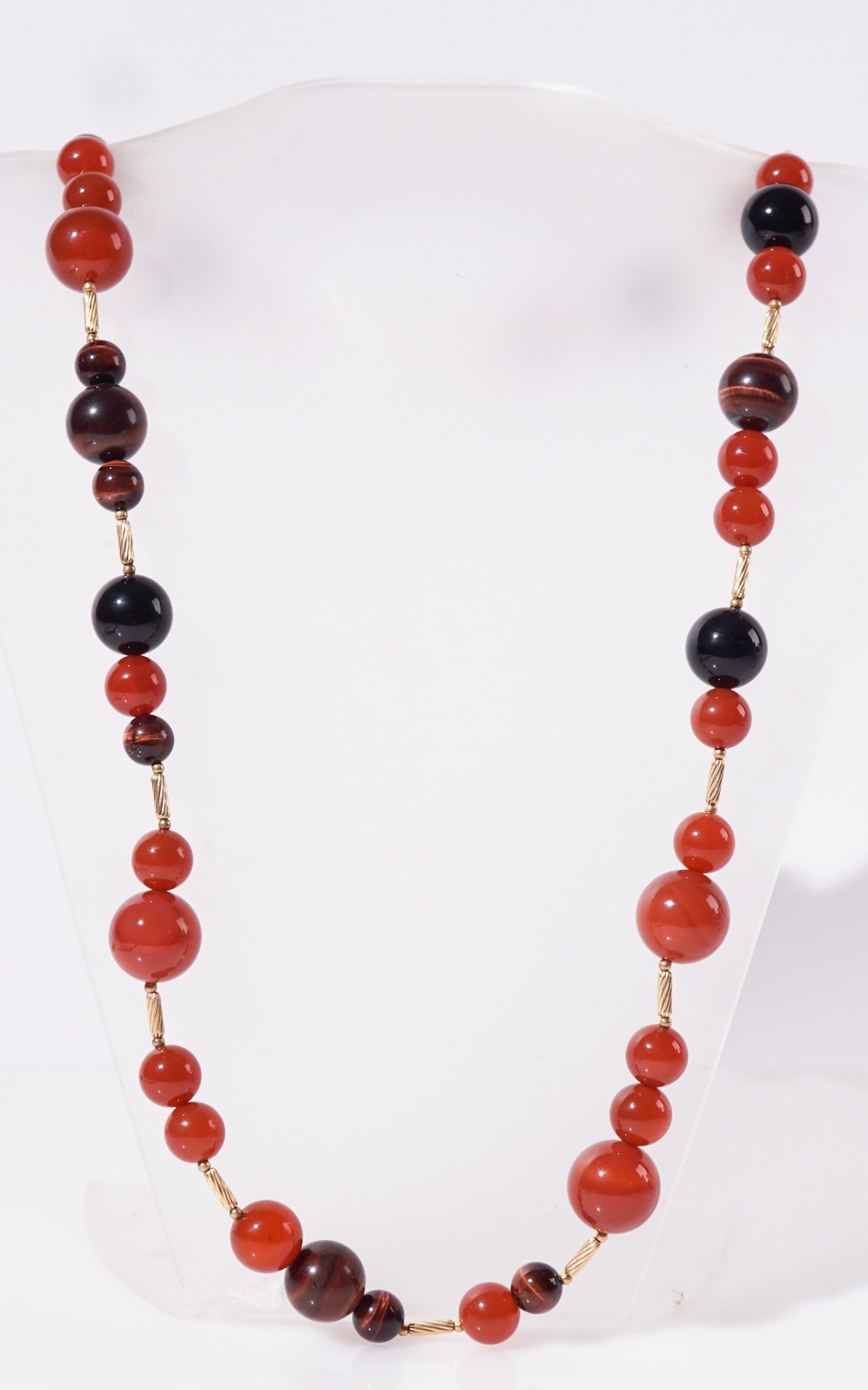 David Yurman 18-Karat Yellow-Gold and Hardstone Bead Necklace, Gross weight: 94.4 dwt., Length:: David Yurman 18-Karat Yellow-Gold and Hardstone Bead NecklaceConsisting of black onyx, tiger’s eye, carnelian and agate beads measuring from 10 to 18.3 mm.Property from a Prominent Potomac Colle