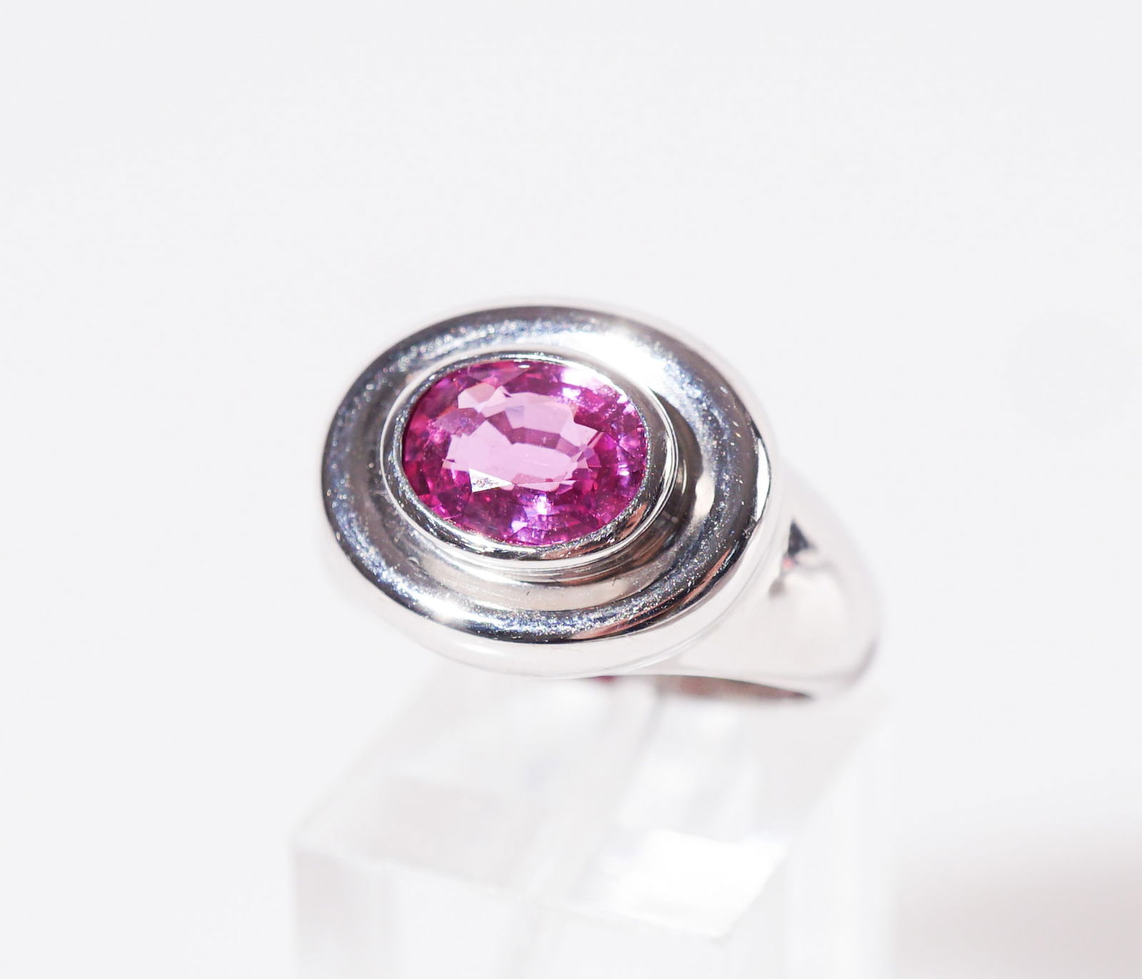 Paloma Picasso for Tiffany & Co. 18-Karat White-Gold and Pink Sapphire Ring, Gross weight: 8.3 dwt.,: Paloma Picasso for Tiffany & Co. 18-Karat White-Gold and Pink Sapphire RingCentered with one bezel set oval pink sapphire weighing approximately 2.50 carats. Signed.Gross weight: 8.3 dwt.Shank size: 6