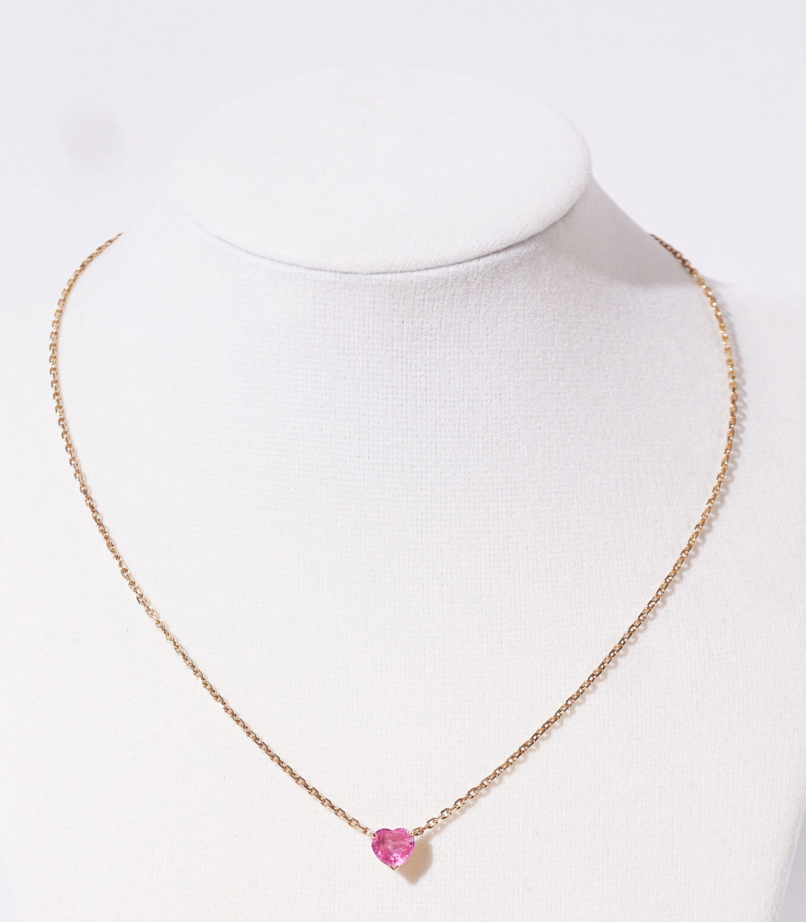 Cartier 18-Karat Yellow-Gold and Pink Sapphire Necklace, Gross weight: 2.8 dwt., Length: 15-1/4 in: Cartier 18-Karat Yellow-Gold and Pink Sapphire NecklaceSet with one pear-shaped pink sapphire weighing approximately 1 carat. The clasp signed and numbered M11749.Gross weight: 2.8 dwt.Length: 15-1/4
