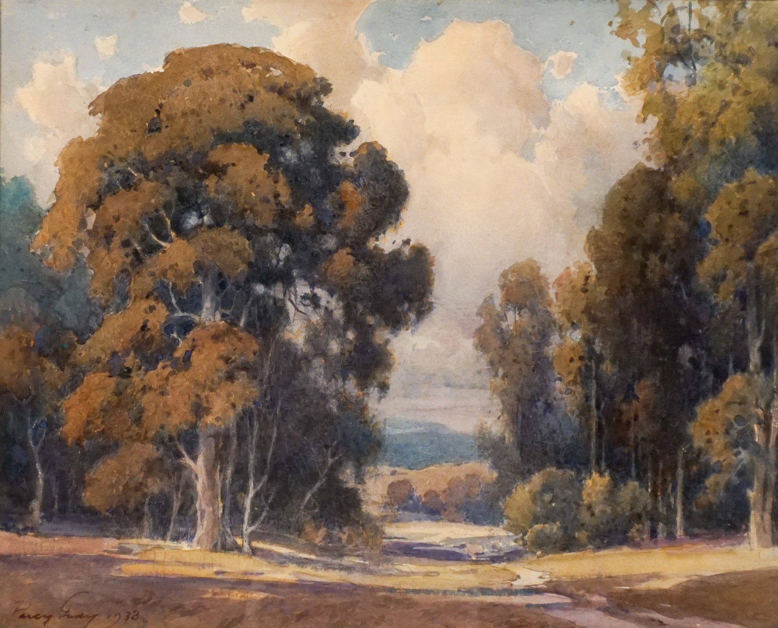 Percy Gray (American 1869-1952), A Road Through the Oaks, Watercolor and graphite on paper, Sight: Percy Gray (American 1869-1952) A Road Through the Oaks Watercolor and graphite on paper Signed Percy Gray and dated 1933 l.l. Property from the Estate of Milton Joseph Stoutenburgh Sight size: 15-1/2