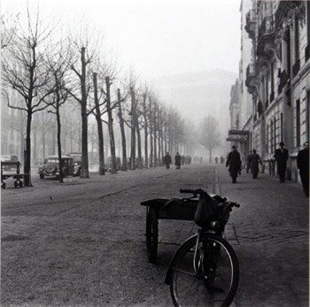 Edward Clark (American 1912-2000): Edward Clark (American 1912-2000),Paris Street with Bicycle, Police Officer and Pont Neuf: Group of Three Works,Each a black and white photograph, each signed Edward Clark- Life in pencil l.r., the fi