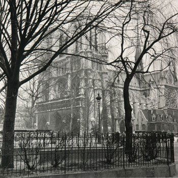 Edward Clark (American 1912-2000) Print Stall, No: Edward Clark (American 1912-2000),Print Stall, Notre Dame and Le Pont Neuf: Group of Three Works,Each a black and white photograph, each signed Edward Clark- Life in pencil l.r., the first and second
