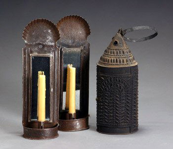 Pair of American Mirrored Tin Sconces and a Black: Pair of American Mirrored Tin Sconces and a Black Painted Pierced Tin 'Revere' Lantern 19th Century The pair of sconces with clamshell-form crest and rectangular mirror plate; the lantern with geometr