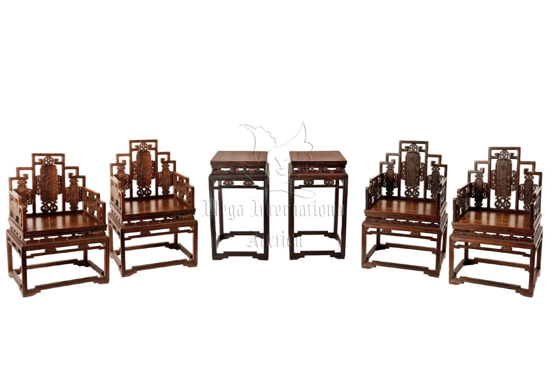 A SET OF FOUR ZITAN HIGH BACK SCROLL FRAME CHAIRS: A set of Zitan furniture consisting of four scroll framed armchairs, inset with carved phoenix patterns, and two en suite tea tables. All rest on square legs and on a similarly designed base frame. Re