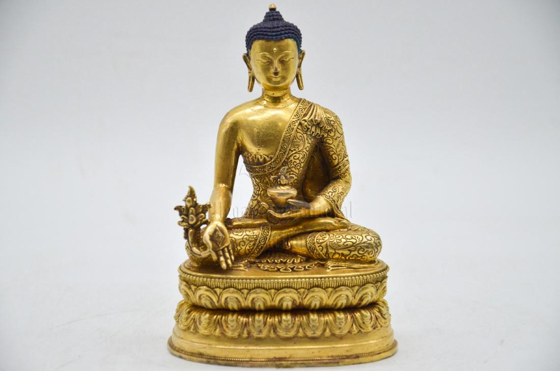 GILT BRONZE CAST BHAISAJYAGURU SEATED FIGURE (1 of 6)