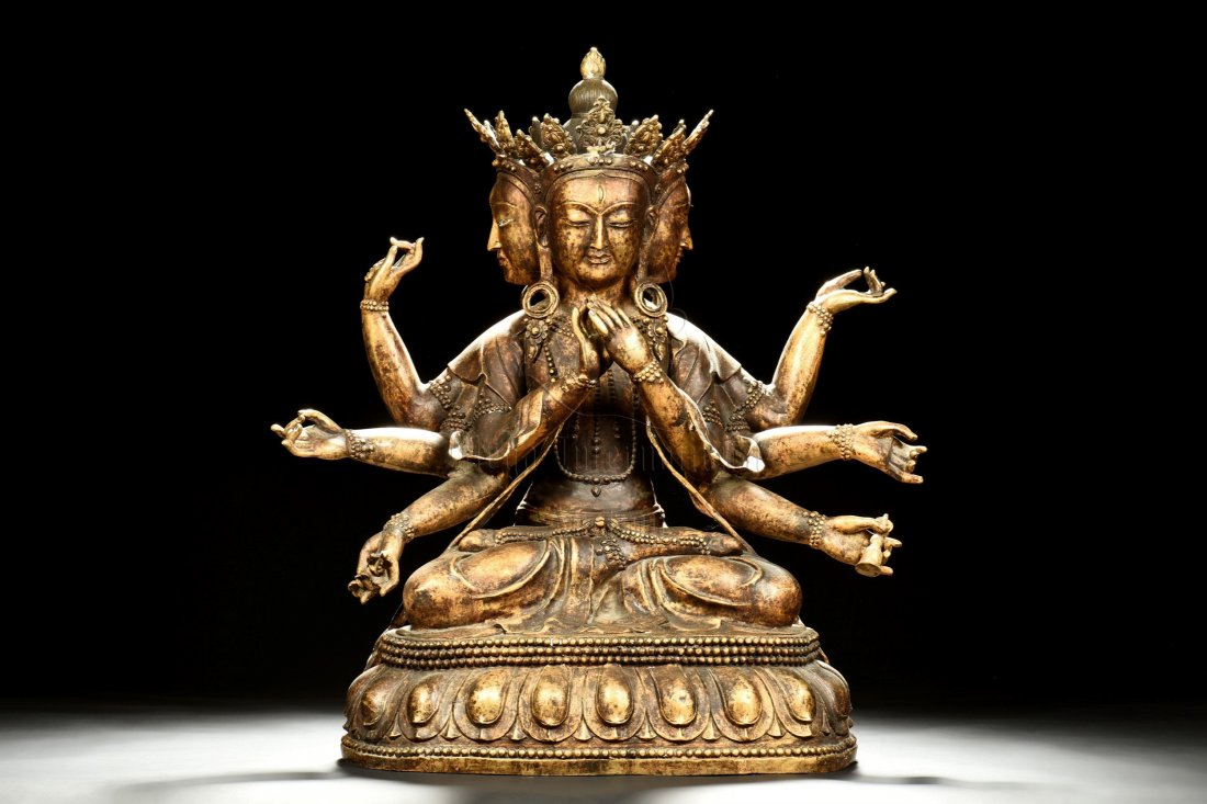BRONZE CAST BUDDHA WITH FOUR FACES AND EIGHT ARMS (1 of 10)