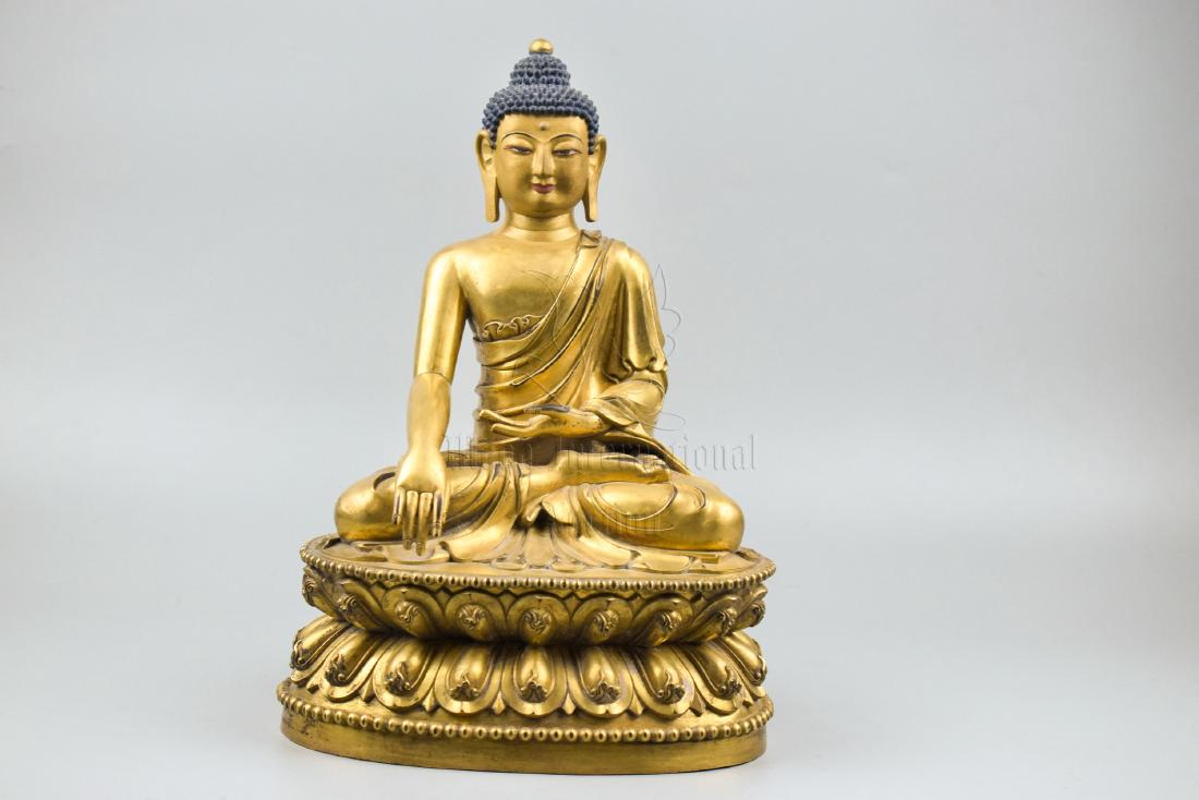 GILT BRONZE CAST SHAKYAMUNI SEATED FIGURE (1 of 5)