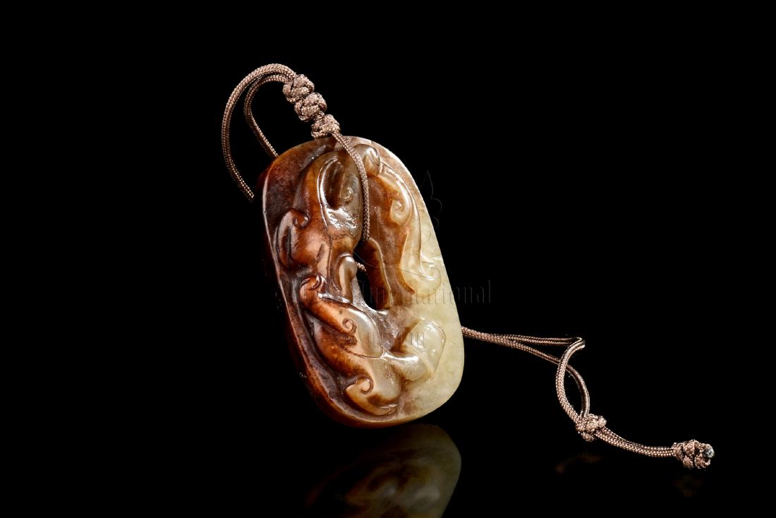 JADE CARVED 'MYTHICAL BEASTS' SWORD ORNAMENT (1 of 9)