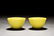 PAIR OF LEMON YELLOW GLAZED CUPS WITH WOODEN STANDS - 2